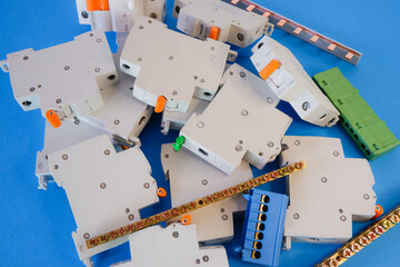 Different electrical equipment on blue background. Various electric products.