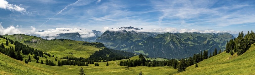 Panoramic view on beautiful green Swiss Alps as seen from Hoch Ybrig