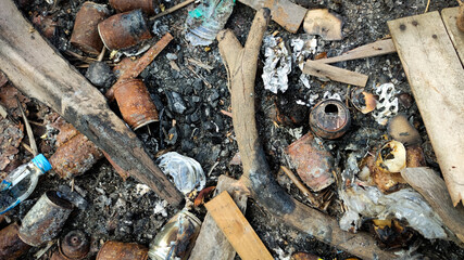 Beach pollution. Plastic bottles and other trash on sea beach. Ecological concept. earth day...