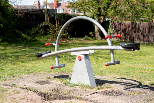 children's swing in the park on sunny day