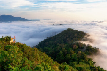 Sea of Mist, beautiful mist along the mountains during sunrise time. Taken at from Ai Yerweng Skywalk at Yala province in Thailand.