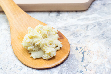Shea butter on light background, unrefined, close up
