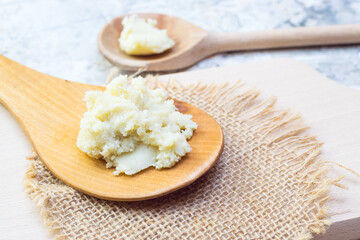 Shea butter on light background, unrefined, close up