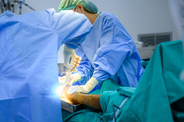 Close up of male orthopedic doctor And the assistant team is working Orthopedic doctors are doing...