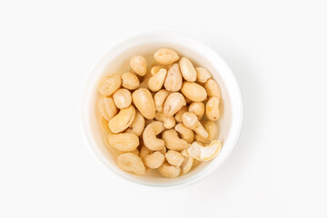 Process of soaking various nuts: cashew in water to activate. Home Cooking: making plant based organic veggie Milk, lactose free.