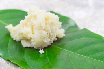 Shea butter on light background, unrefined, close up