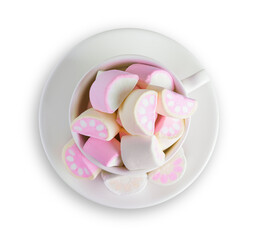 Colorful marshmallows in a white cup isolated on a white background. Fluffy marshmallow texture closeup.