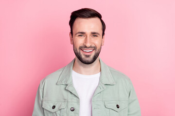 Portrait of attractive guy toothy smiling wearing modern clothes isolated on pink color baclground