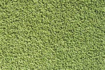 Background from woolen cloth of solid green color, blank for design