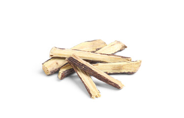 Dried sticks of liquorice root on white background