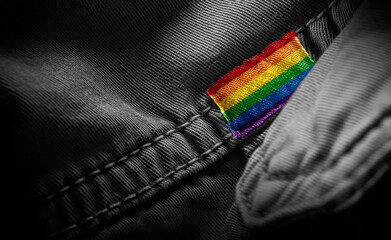 Tag on dark clothing in the form of the flag of the lgbt