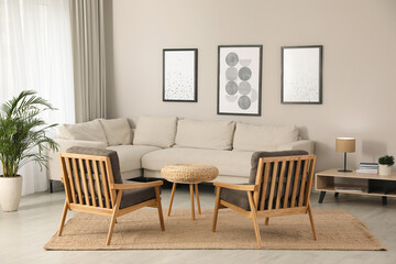 Fototapeta na wymiar Stylish living room interior with comfortable furniture