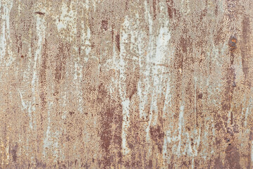 Texture of an old metal fence. Scratched metal sheet with  paint.