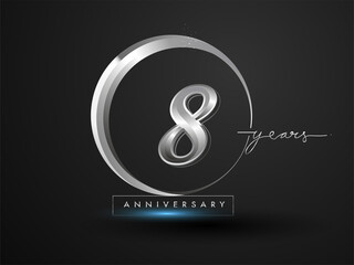 8 Years Anniversary Celebration. Anniversary logo with ring and elegance silver color isolated on black background, vector design for celebration, invitation card, and greeting card