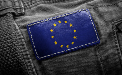 Tag on dark clothing in the form of the flag of the European Union