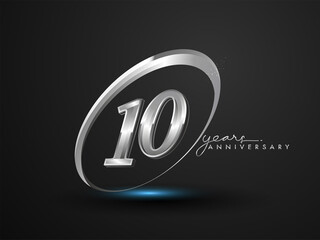 10 Years Anniversary Celebration. Anniversary logo with ring and elegance silver color isolated on black background, vector design for celebration, invitation card, and greeting card