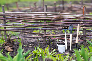 shovel, rake, bucket, fence. Farming
