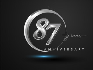 87 Years Anniversary Celebration. Anniversary logo with ring and elegance silver color isolated on black background, vector design for celebration, invitation card, and greeting card