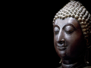 Buddha face statue. A heritage antique symbol of clam, enlighten and meditate. Head and face statue of Buddhism religion, show traditional culture of Asian spirituality. Portrait sculpture style.