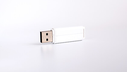 USB stick on a light background. Place for your text.