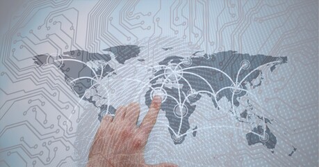 Composition of man touching virtual screen with world map and circuit board elements