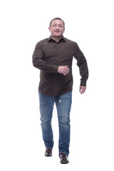 Fototapeta premium in full growth. satisfied casual man striding forward .