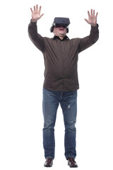 in full growth. casual man in virtual reality glasses.