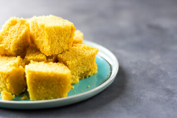 Sfouf Lebanese semolina turmeric pie. Arabic cuisine. Vegan dessert.  Selective focus.