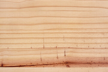 Closeup of light wooden texture background with natural pattern.
