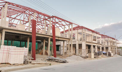 Fototapeta na wymiar construction residential new house in progress at building site