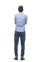 Fototapeta premium rear view . a young man in jeans looking at a white screen.
