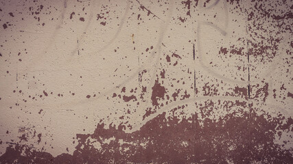 An old destroyed wall with cracks and scratches. Abstract grunge background texture for design posters, advertising and more.