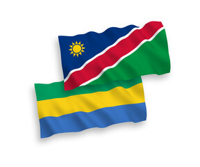 Fototapeta premium Flags of Republic of Namibia and Gabon on a white background