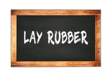 Obraz premium LAY RUBBER text written on wooden frame school blackboard.