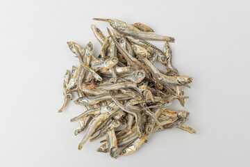 Dry anchovies on white background