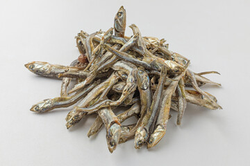 Dry anchovies on white background