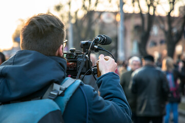man video operator shoots video