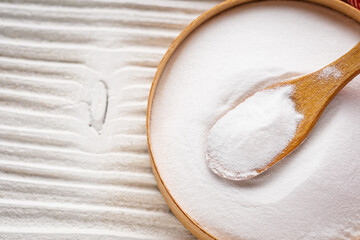baking soda powder on wooden rustic background background
