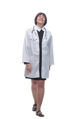 proud woman doctor striding forward. isolated on a white background.