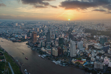 Fototapeta na wymiar Aerial view of downtown cityscape photo at sunset - Ho Chi Minh city