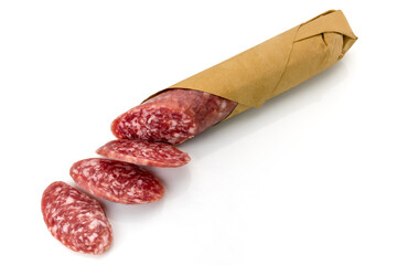 Italian salami, whole sausage cut wrapped in butcher paper with slices,  isolated on white