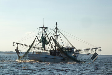 Naklejka premium Fishing boats on the ocean