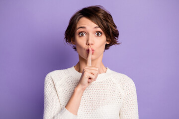 Photo of sweet adorable young woman finger lips ask not tell secrets isolated purple color background