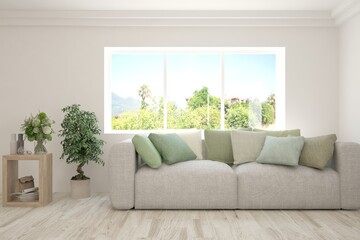 White living room with sofa and summer landscape in window. Scandinavian interior design. 3D illustration