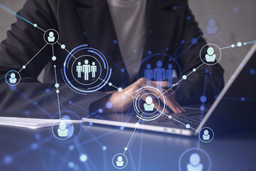HR woman specialist is typing the keyboard in the internet to find the best candidates to create...