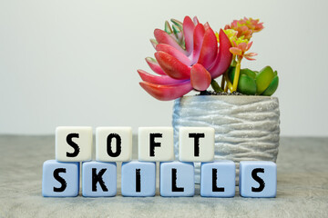 Soft cubes with the abbreviation Soft Skills with a flower