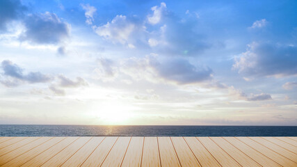 Fototapeta na wymiar top long wooden desk with sea sunset view and copy space,sky relaxing concept,beautiful tropical background for travel landscape