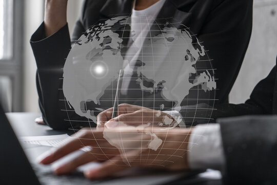 Two businesswomen working together in office. Abstract map illustration double exposure.