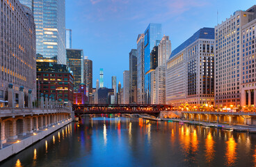 Fototapeta premium Chicago skyline after sunset showing Chicago downtown. Chicago, on Lake Michigan in Illinois, is among the largest cities in the U.S. 