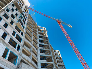 Construction site with crane. Industrial background.